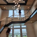 Dust Busters crew cleaning high windows after renovation – post-construction window cleaning in Union County NJ